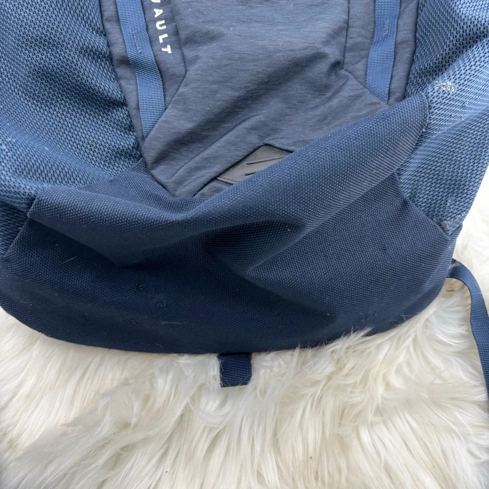 The North Face Blue Backpack with Durable Design and Versatile Functionality